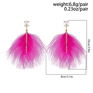 Macro detail of pink feather drop earrings with silver rhinestones and measurements