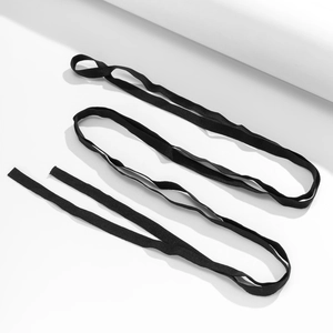 Detailed view of elastic black leg harness straps with durable woven fiber texture