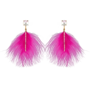 Detailed close-up of fuchsia feather earrings with rhinestone chain and crystal stud
