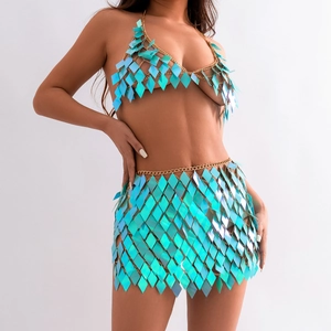 Detail of sequin body chain set with iridescent scales on halter top and skirt
