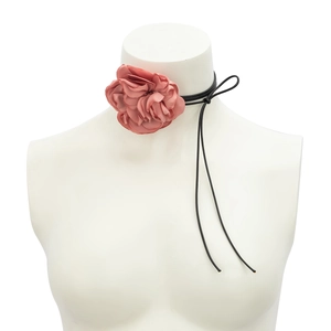 Detail of vintage dusty rose chiffon flower choker with long black adjustable tassels