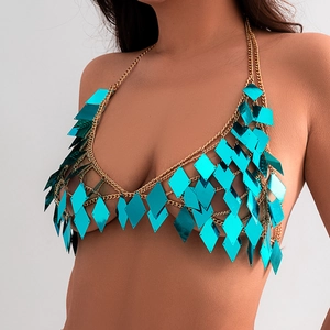 Close-up of golden body chain featuring layered teal rhombic sequins with mirror finish