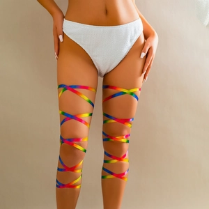 Close-up of vibrant rainbow silk leg chain straps with textured white bikini bottom