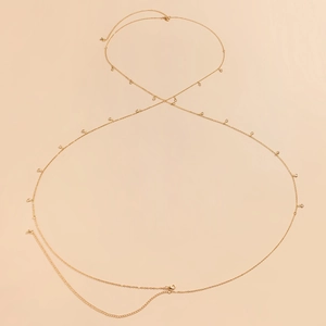 Detailansicht der goldenen Schmetterling Quaste Körperkette mit Karabiner und Verlängerung