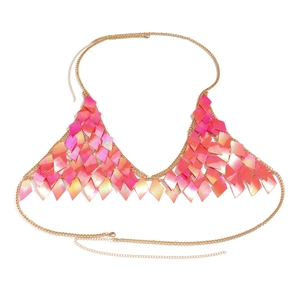 Detailed view of iridescent pink gradient sequins on gold mesh bikini body chain