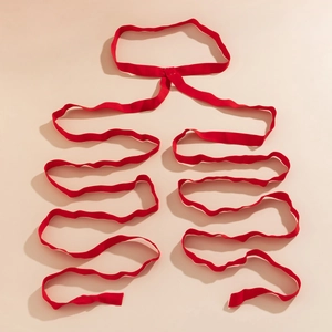 Detailed flat lay of red elastic multi-layer leg chain harness with geometric straps
