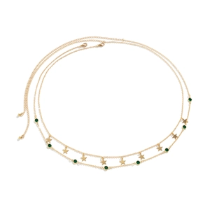 Detailansicht der goldenen zweilagigen Kette mit Sternen und grünen Kristallanhängern