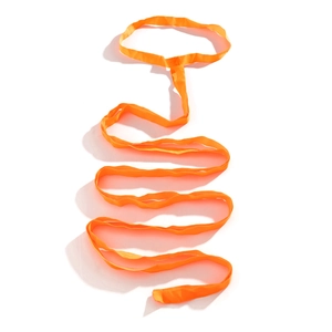 Detail of vivid orange elastic thigh chain strap showing smooth nylon texture and flexibility