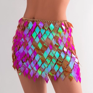 Close-up of holographic sequin body chain with diamond-shaped scales and gold-tone links