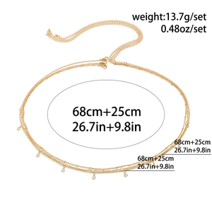 Détail d'une chaîne de corps dorée multicouche avec pendentifs en cristal et dimensions