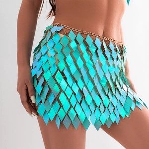 Detail of colorful sequins and gold chain links on this boho festival sequin skirt