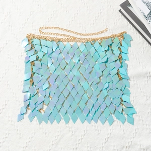 Detail of sky blue sequin mesh body chain with gold metal rings for party wear