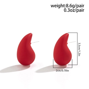 Detailed view of large red matte teardrop earrings with dimensions and weight specs