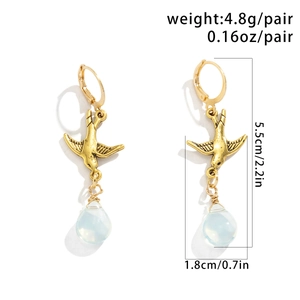 Detailed view of vintage gold swallow earrings with blue opal drop and size dimensions