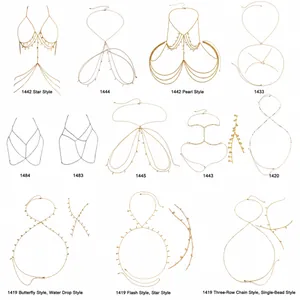 Golden butterfly and star rhinestone body chains for women with tassel accents