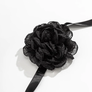 Detailed view of handmade black fabric 3D rose choker with delicate gauze petals