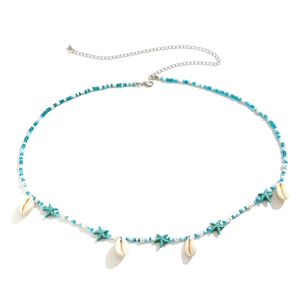 Chaîne de taille bohème perlée avec breloques d'étoile de mer turquoise et coquillages