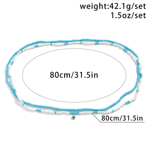 Détail de la chaîne de corps mauvais œil montrant 80 cm de long et 42,1 g de poids