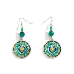 Bohemian silver drop earrings with green beads and mandala pattern in exotic style