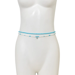 Détail de la chaîne de taille perlée double épaisseur avec perles bleues et mauvais œil
