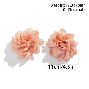Detailed view of large fabric flower earrings with 11cm diameter and apricot chiffon petals