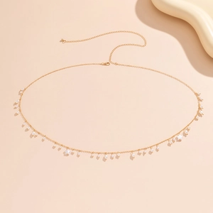 Sexy gold body chain with tassels, faux pearls and star pendants for women's waist