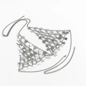Detail of silver body chain with polished metal stars and adjustable lobster clasp