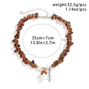 Detail of mushroom necklace with brown chips and pearls, showing 35+7cm length size