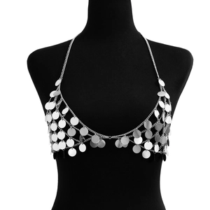 Detail of silver body chain with multi-layer metal sequins and fringe tassels
