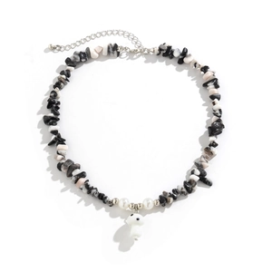 Detail of colorful irregular gravel necklace featuring a white mushroom charm and pearls