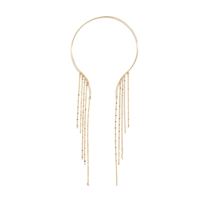 Detailed close-up of polished gold punk metal collar necklace with long tassel chains