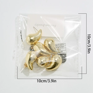 Detail view of 10cm golden teardrop earrings showing dimensions and high-polish finish