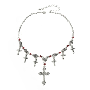 Gothic cross necklace featuring red beads and intricate silver-tone charms on a chain