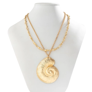 Close-up of double-layer ocean themed necklace with nautilus pendant and shell details