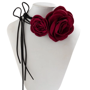 Detail of dark red fabric 3D rose choker with long black adjustable neck tie straps