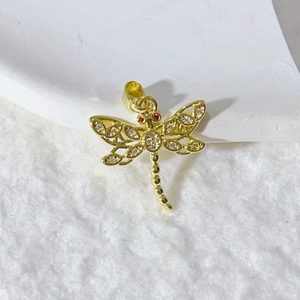 Exquisite gold dragonfly pendant with sparkling zircon wings and red gemstone eyes