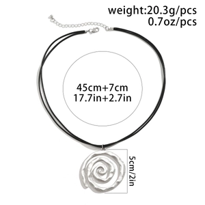 Detail view of Bohemian spiral conch pendant with specific dimensions and weight