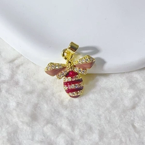 Gold plated honey bee pendant with micro-pave cubic zirconia and red enamel wings
