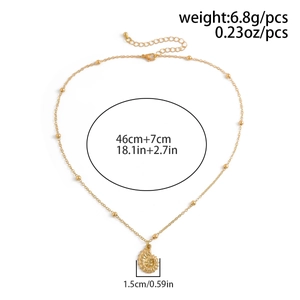 Detailed view of conch pendant necklace with measurements 46cm length and 6.8g weight