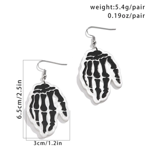 Detail view of acrylic skeleton hand earrings with dimensions and weight for Halloween