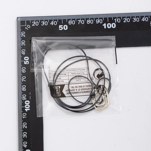 Detail of bohemian starfish pendant necklace with black cord shown on a measuring scale