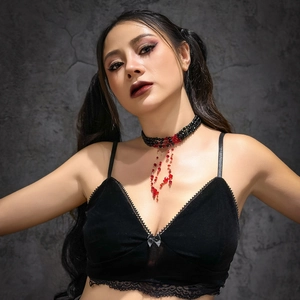 Gothic black beaded choker detail featuring vivid red crystal blood drop pendants
