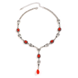Gothic silver bat necklace with blood red ruby pendant for Halloween dark aesthetic