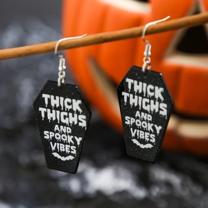 Gothic coffin acrylic earrings with Thick Thighs Spooky Vibes text for Halloween