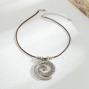 Bohemian seashell spiral snail pendant necklace with brown woven cord for beach vacations