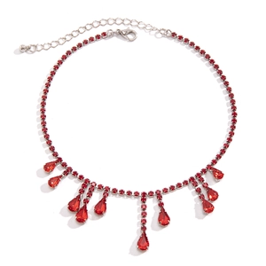 Detailed view of Gothic beaded choker featuring red blood drop crystals and silver chain fringe