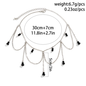 Detail view of silver layered choker chain with black crystal beads and size specifications