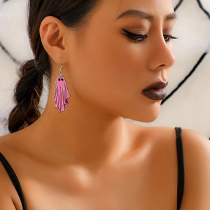 Close-up of model wearing a pink acrylic ghost earring for Halloween party costume
