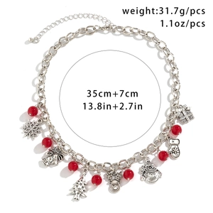 Zilveren kerstketting met feestelijke bedeltjes en rode kralen, ketting 35cm plus 7cm