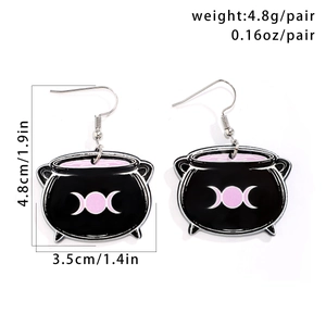 Detail of black witch cauldron acrylic earrings with dimensions and weight specs